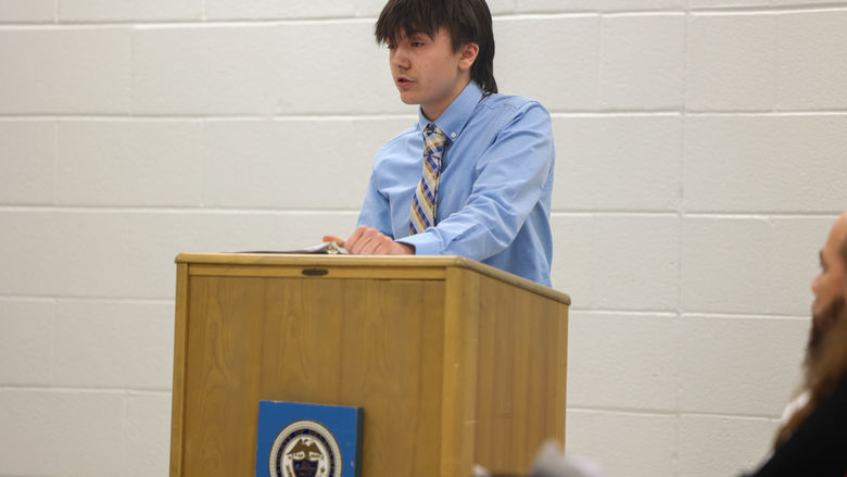 Ryan speaking at podium