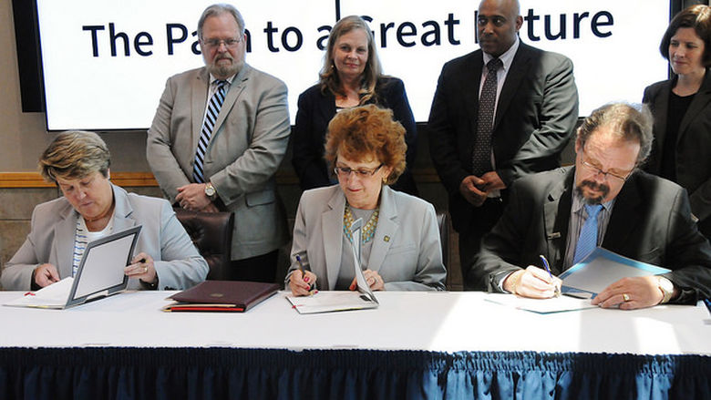 Articulation agreement between Penn State and LCCC is signed at a press conference.