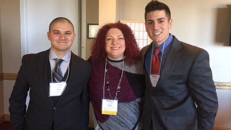 Adam Bivens, Angela Putman and Connor Harootunian stand together