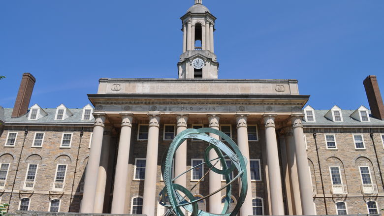 Photo of the front of Old Main at University Park