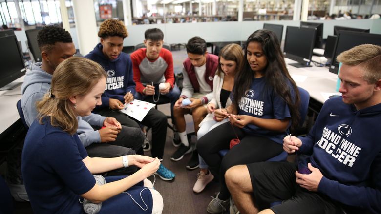 The Mathematics Club crocheting "coral" as part of Earth Science Week. 