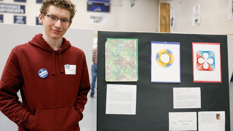 student presenting art work