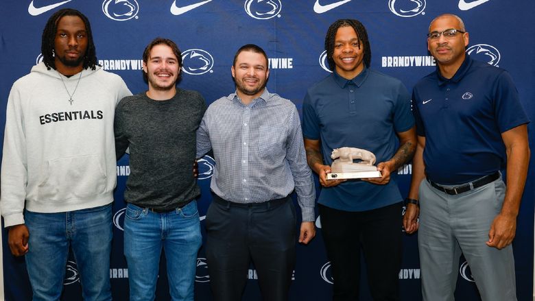 people holding award
