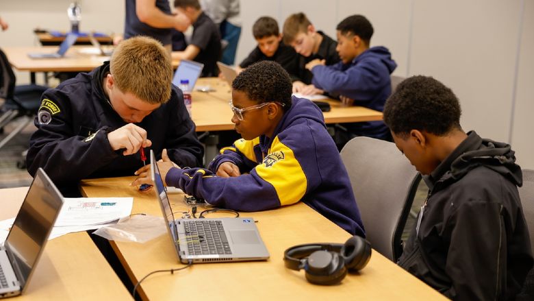 students participating in engineering workshop
