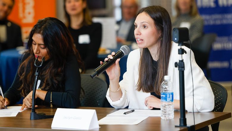 lady speaking into microphone