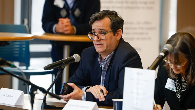 man speaking into microphone