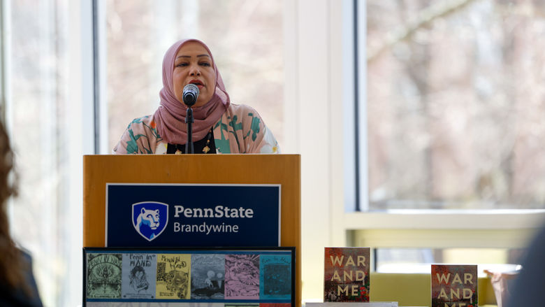 woman speaking at podium