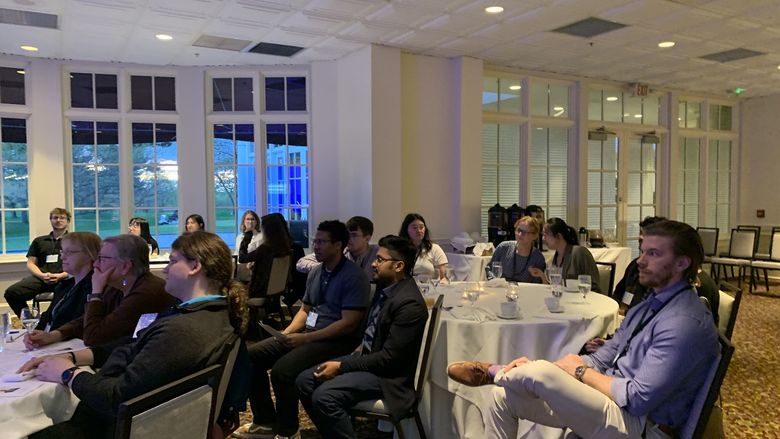 students sitting at tables