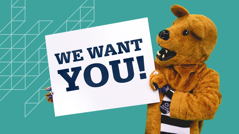 Lion Mascot holding sign that says, "We want you!".