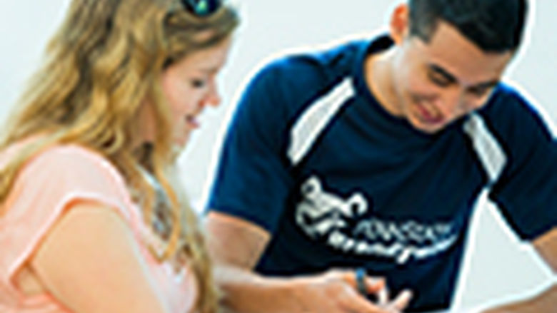 Two students doing classwork