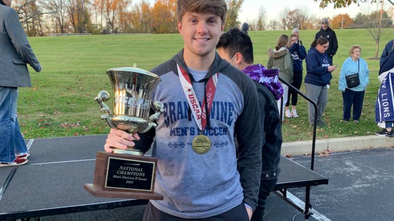 Benjamin Sarafinas holding a trophy