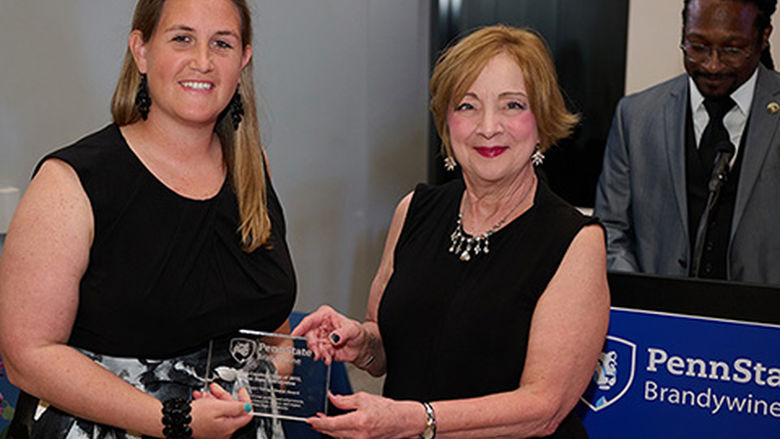 Bobbi Caprice accepting 2022 Young Alumni Award