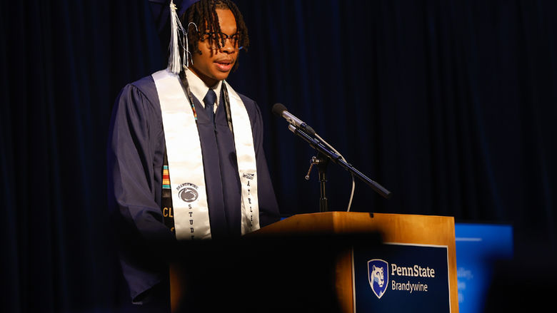 A student speaks at commencement.
