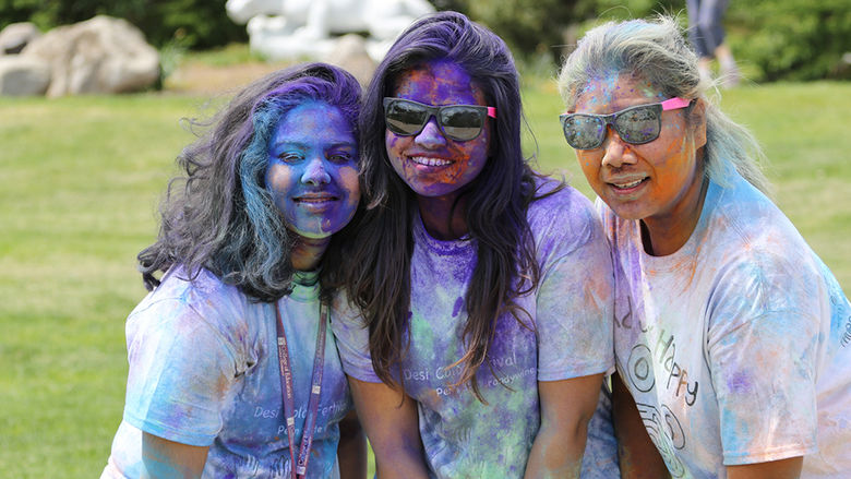 3 female students smiling