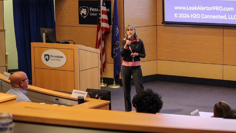 woman speaking to audience
