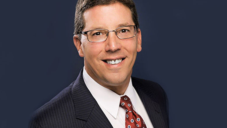 Man smiling with glasses