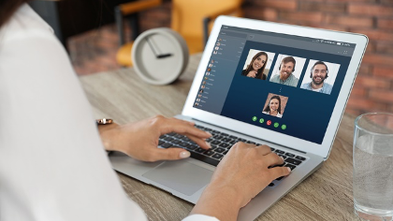 Woman using laptop for video call