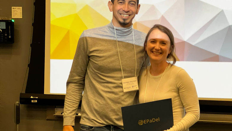 Samantha Pezzimenti holding certificate
