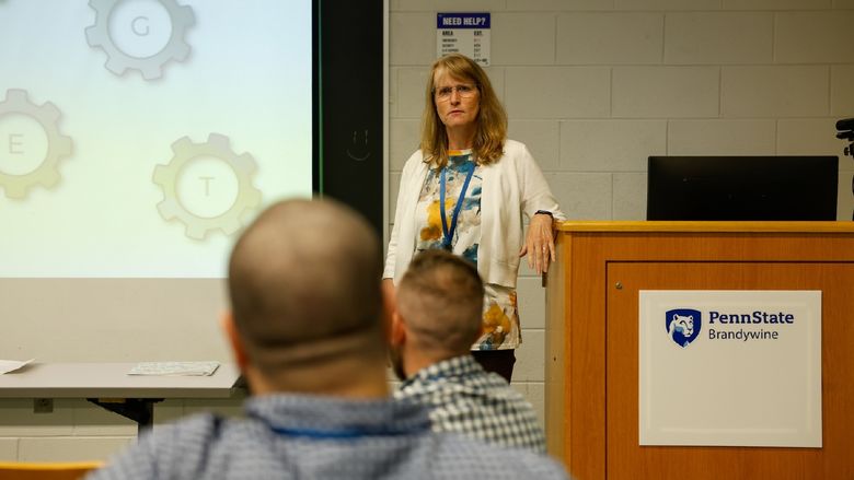 person speaking at podium