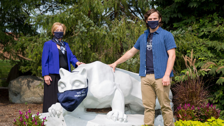 Chancellor Marilyn Wells and SGA President Matthew Wickel at Brandywine's Lion Shrine