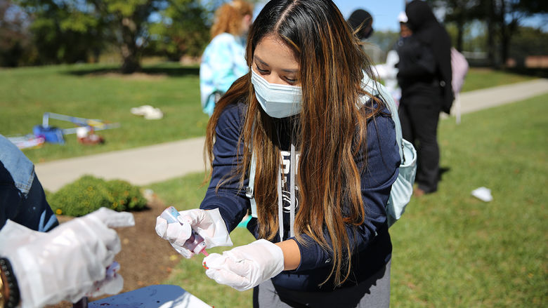 Brandywine student making a tie-dye t-shirt.
