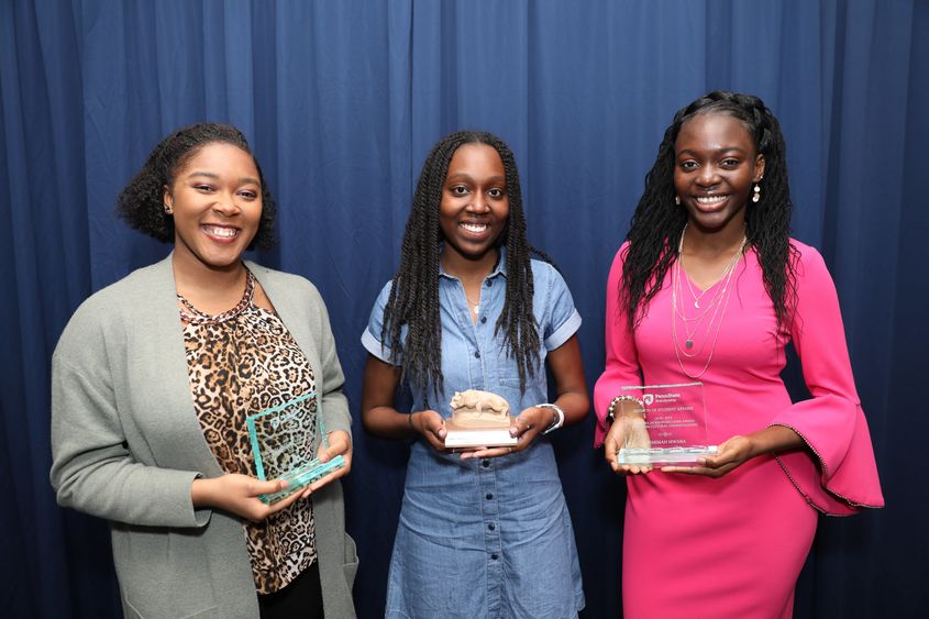 Penn State Brandywine students accept awards. 