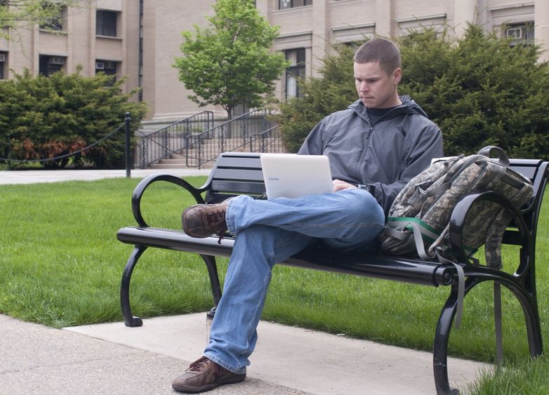 Student studying outside Burrowes