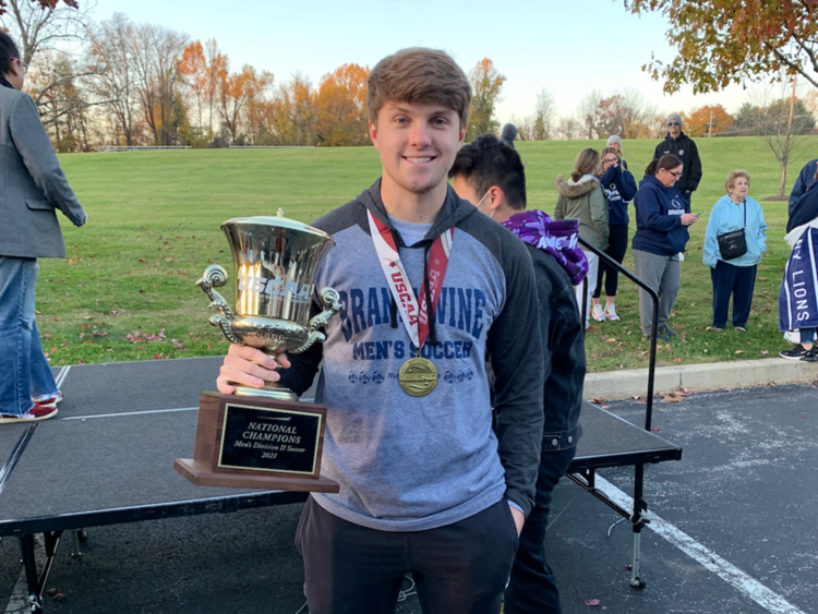 Benjamin Sarafinas holding a trophy