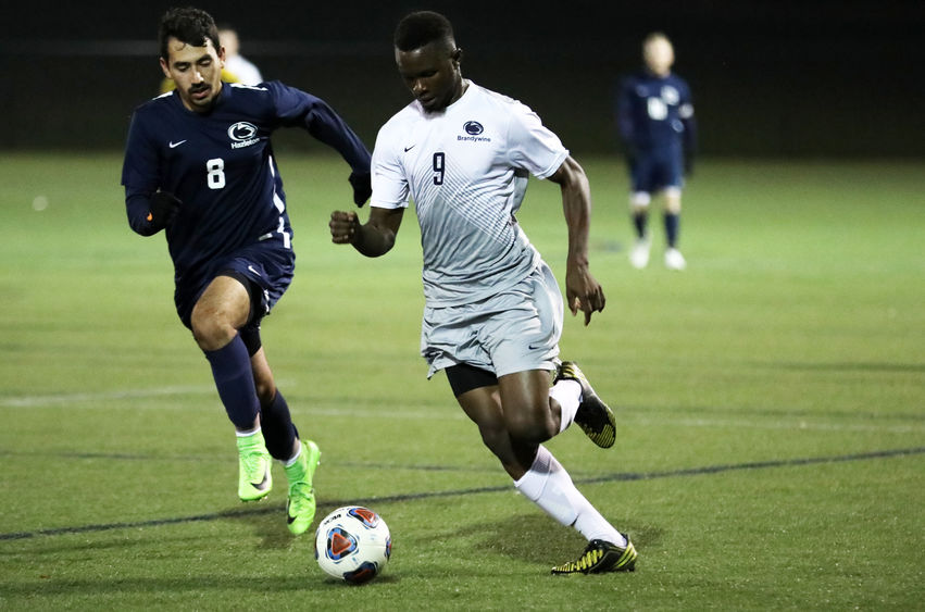 Mohamed Camara dribbles past a defender