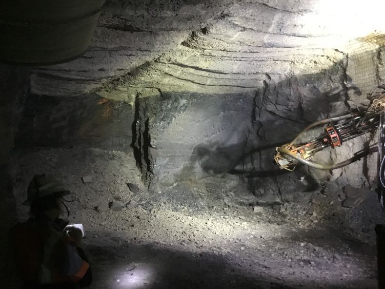 A drill bit in an underground gold mine.