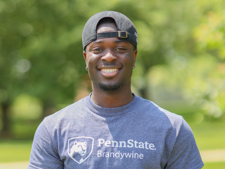Man wearing hat and shirt that reads Penn State Brandywine