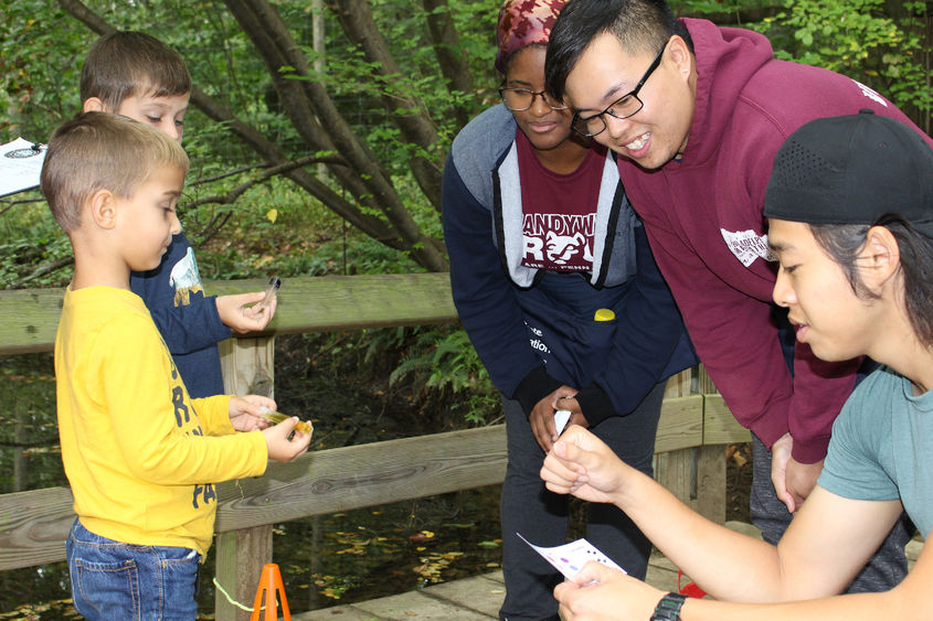 Penn State Brandywine students teaching children at Tyler Arboretum. 