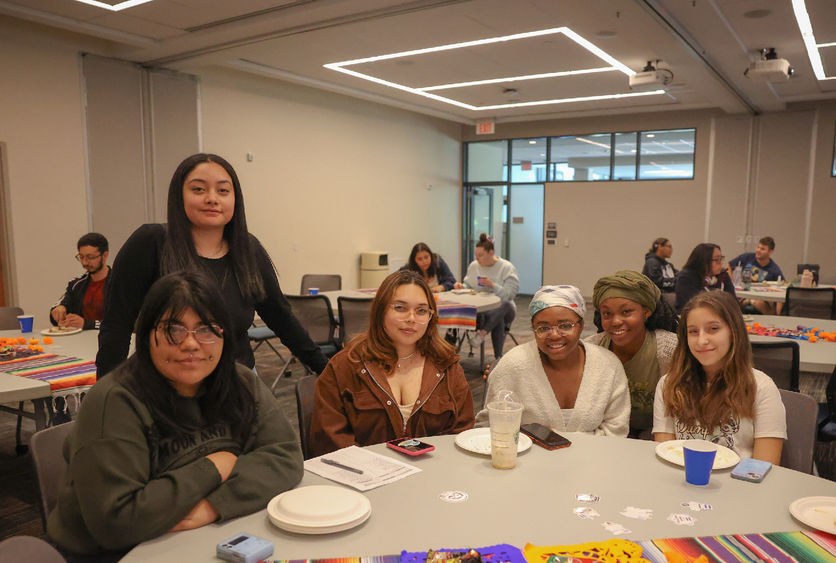 students gathered at a table