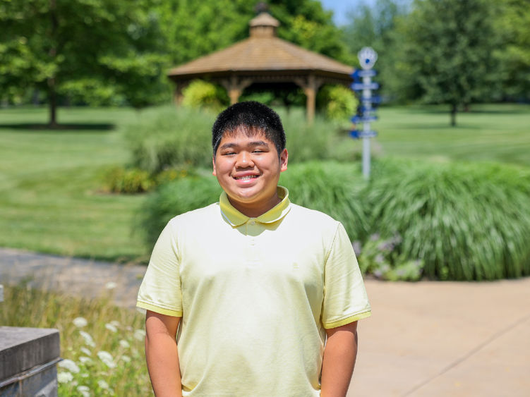 man in yellow shirt