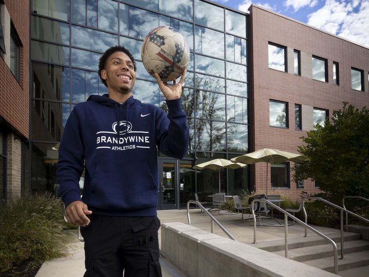 man holding a soccer ball