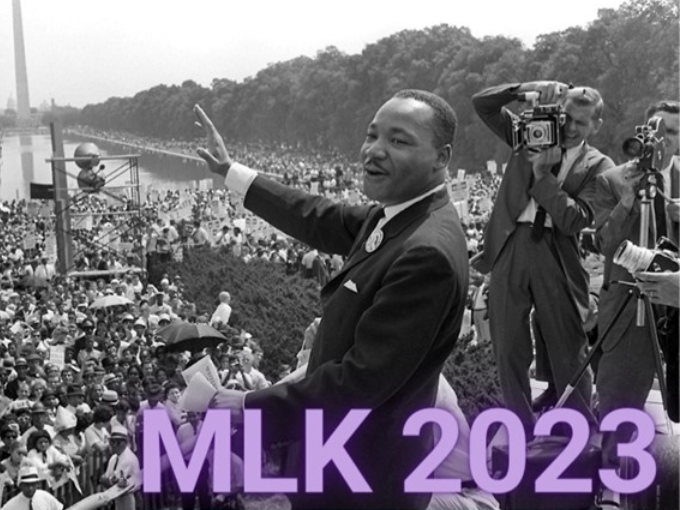 Martin Luther King Jr. waving in Washington DC with "MLK 2023" in the bottom right corner