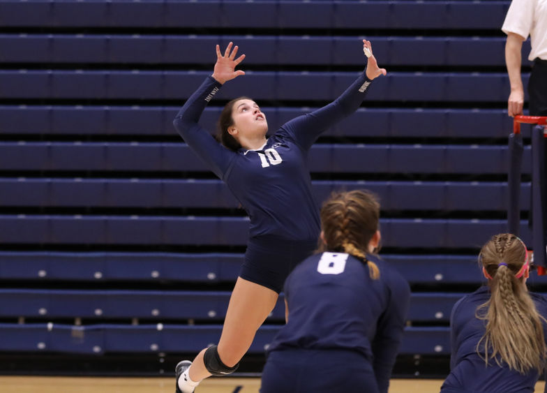 Nikki Poissant swings for a point at the PSUAC Championship