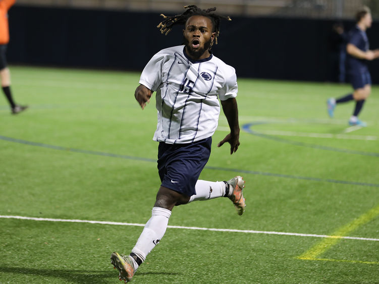 Francis Sarpong celebrates scoring a goal in the conference championship match