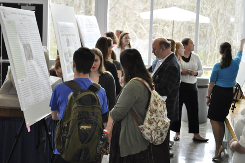 Students discuss posters at EURECA