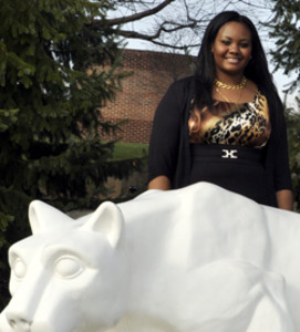 Jomela Dutt standing by the Lion Shrine