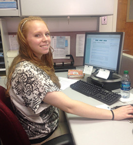 Katie Kashner at her desk