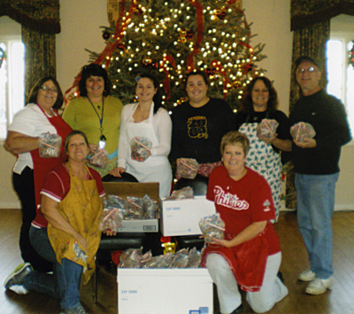 Theresa Walls with family and cookies