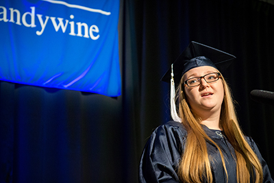 female grad thanking her family