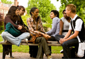 group of students sitting outside